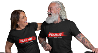 Fear Me Just Because T-shirt featuring bearded man and laughing woman